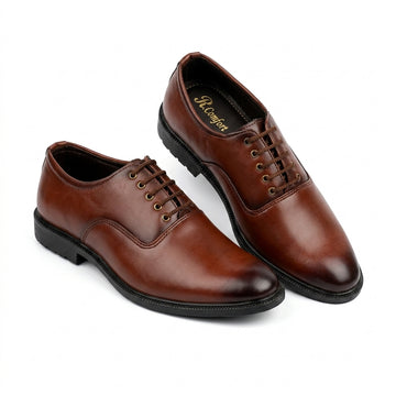 Brown leather plain-toe derby dress shoe pair clean studio shot white background showing brass eyelets