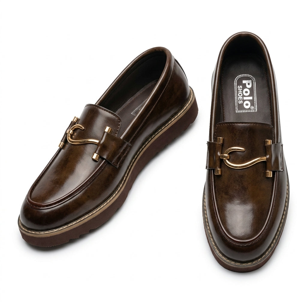 Dark brown burnished leather chunky-sole horsebit loafer on wooden table lifestyle shot with rolled socks