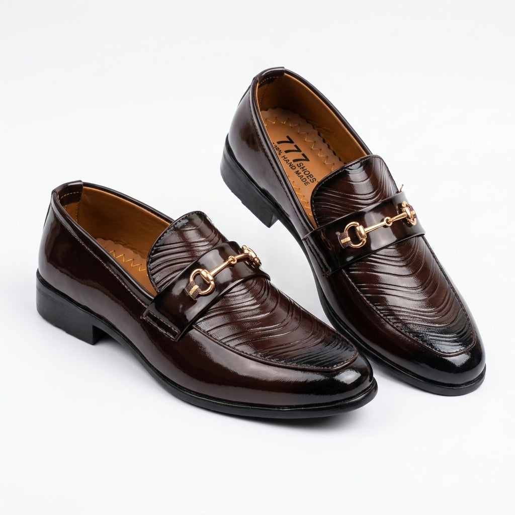 Dark brown patent wave-texture horsebit loafer pair clean studio shot white background showing gold hardware