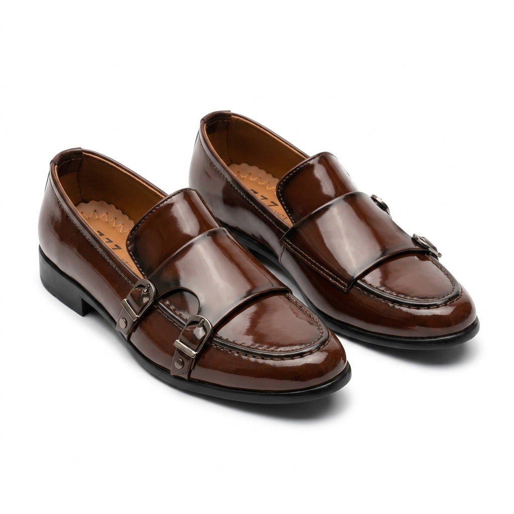Brown patent leather double monk-strap loafer pair clean studio shot white background showing double buckle detail