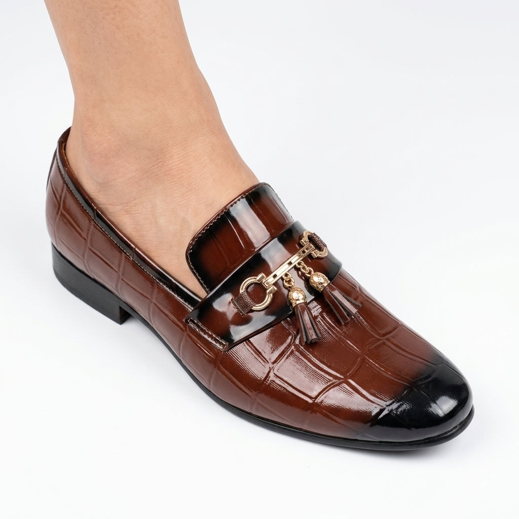 Medium brown leather bit loafer with gunmetal hardware and dark sole