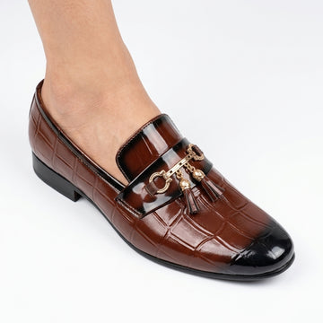 Medium brown leather bit loafer with gunmetal hardware and dark sole
